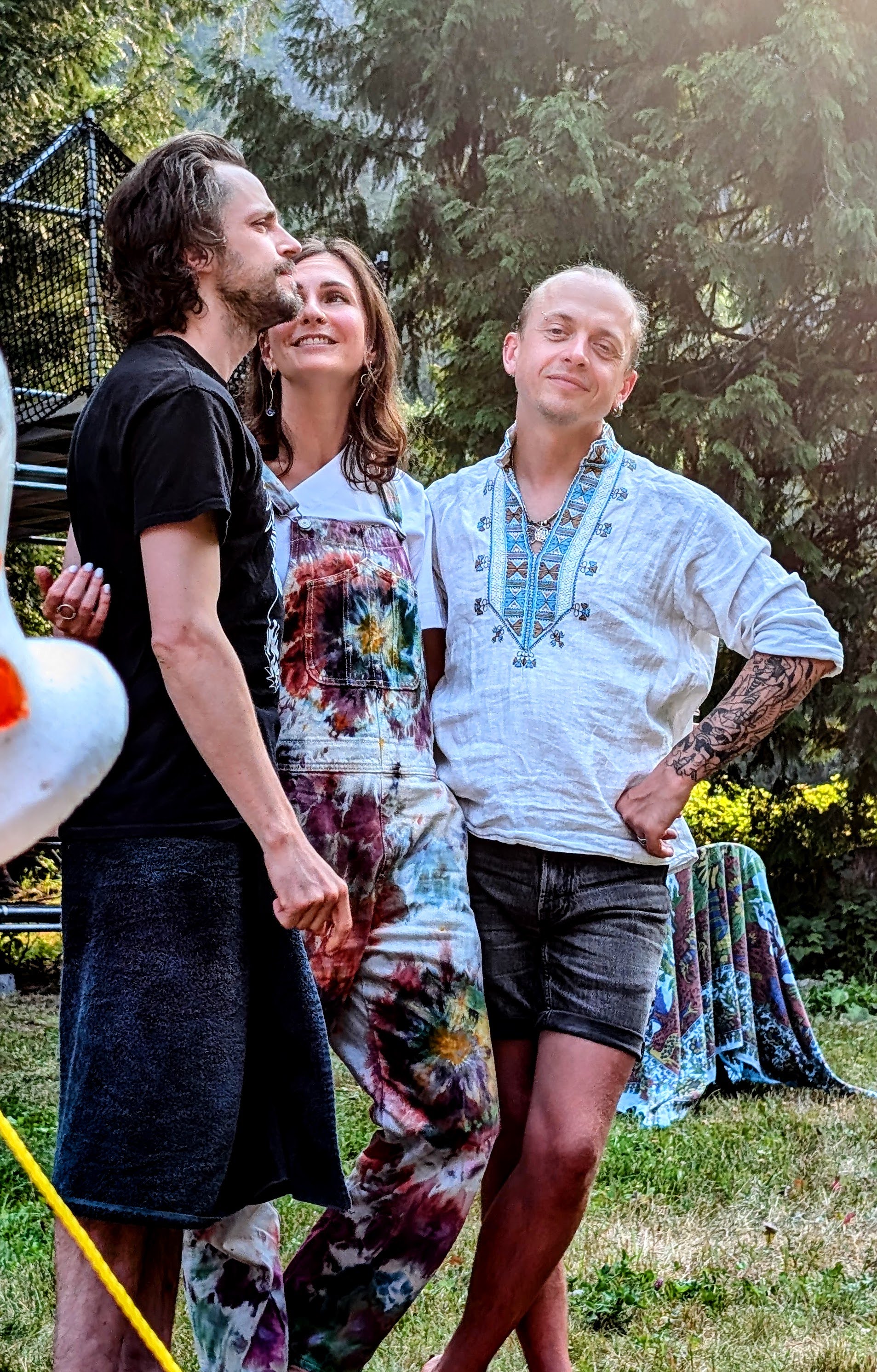 Three attendees together outdoors at Bass n Nova